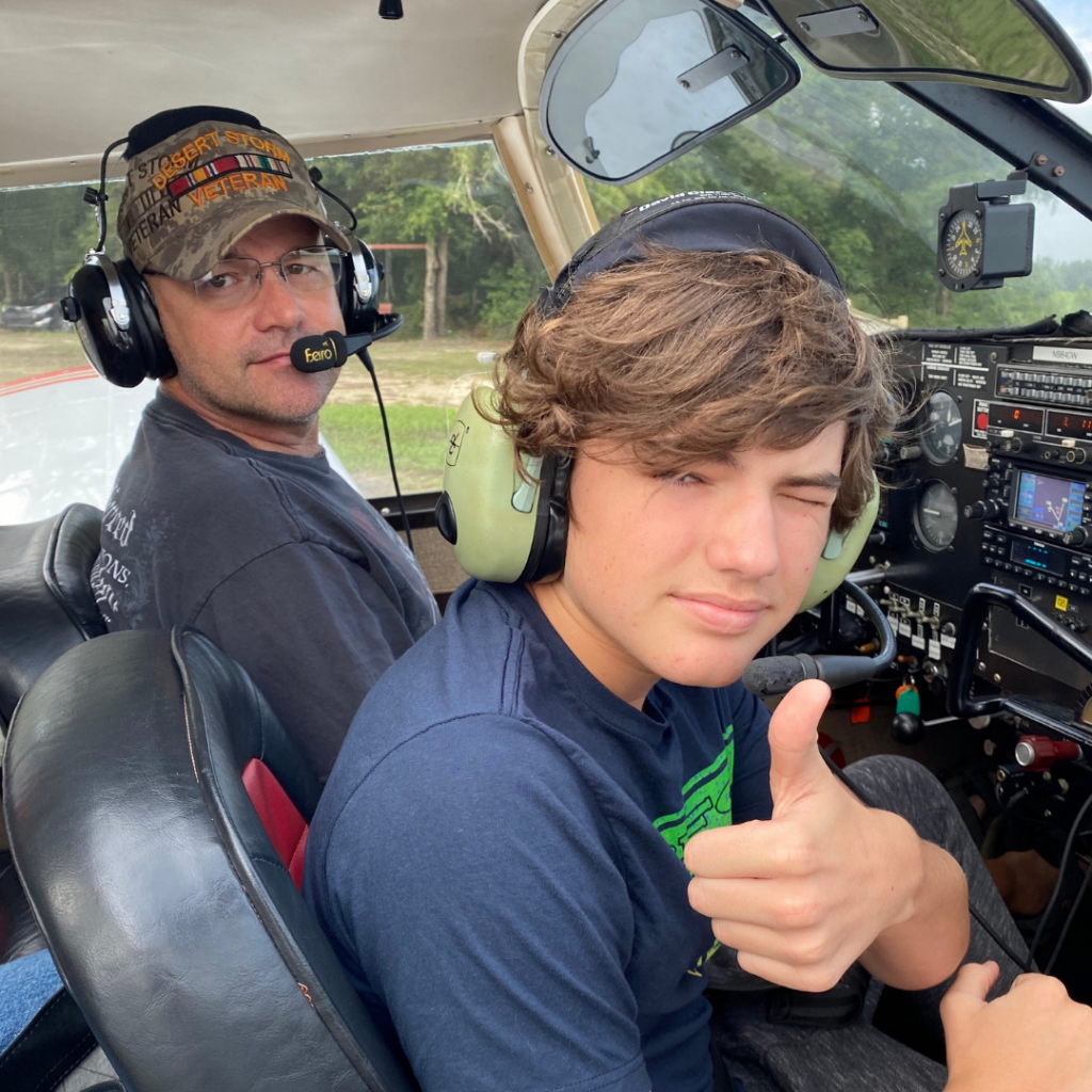 MATT FLYING WITH ONE OF THE CAMP PARTICIPANTS